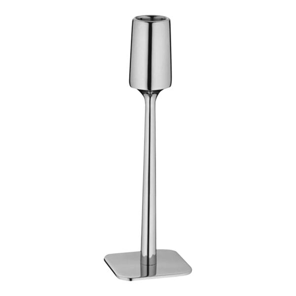A WMF stainless steel candelabra holding candles.
