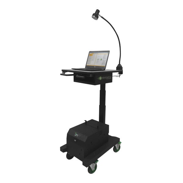 A Newcastle Systems Apex Series sit / stand mobile work station with a laptop on it.