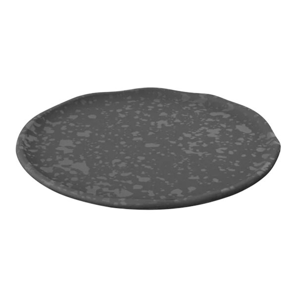 A black plate with speckled spots.