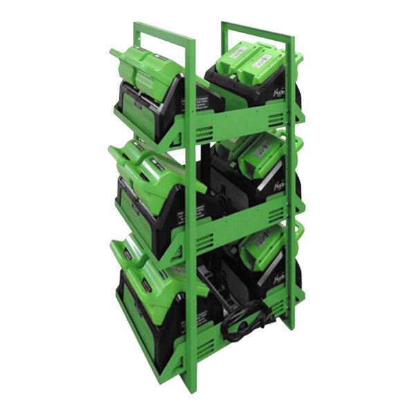 A Newcastle Systems multi-bay charging rack with green and black battery packs.
