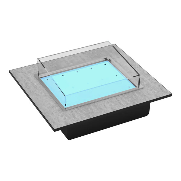 A square concrete object with a clear glass top.