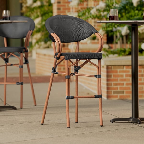 Lancaster Table & Seating Black Teslin Outdoor Arm Barstool
