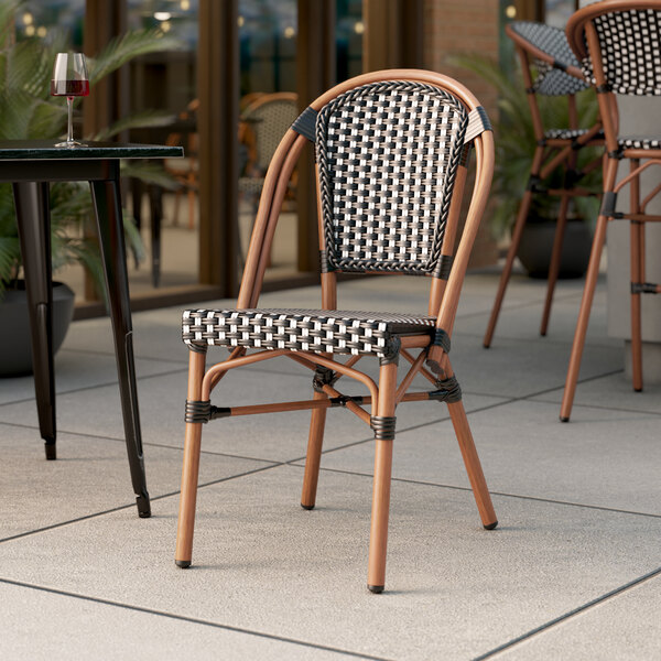 Lancaster Table & Seating Bistro Series Black and White Checkered Weave Rattan Outdoor Side Chair