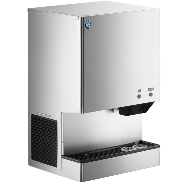 A stainless steel Hoshizaki countertop ice machine with a water dispenser.