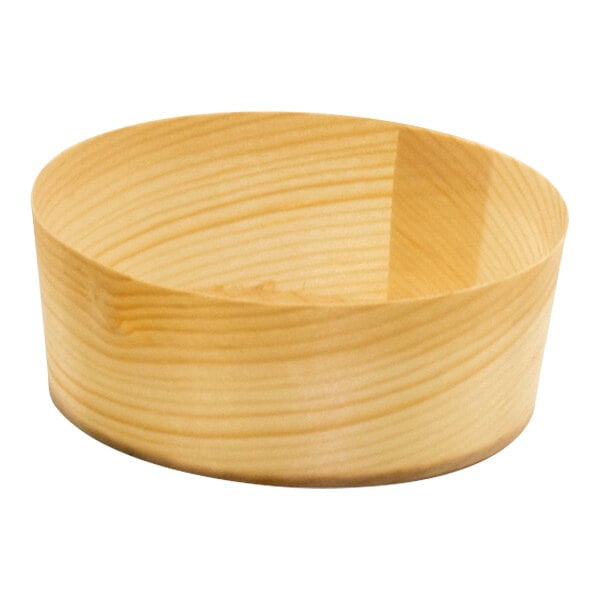A Front of the House Servewise wood ramekin on a wood surface.