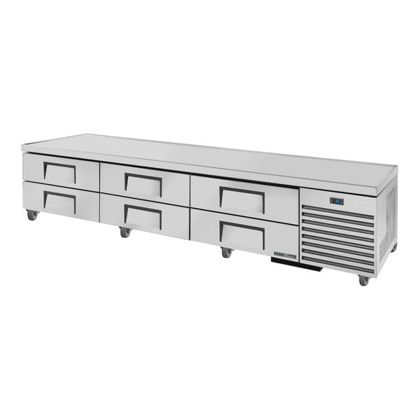 A stainless steel True refrigerated chef base with drawers.