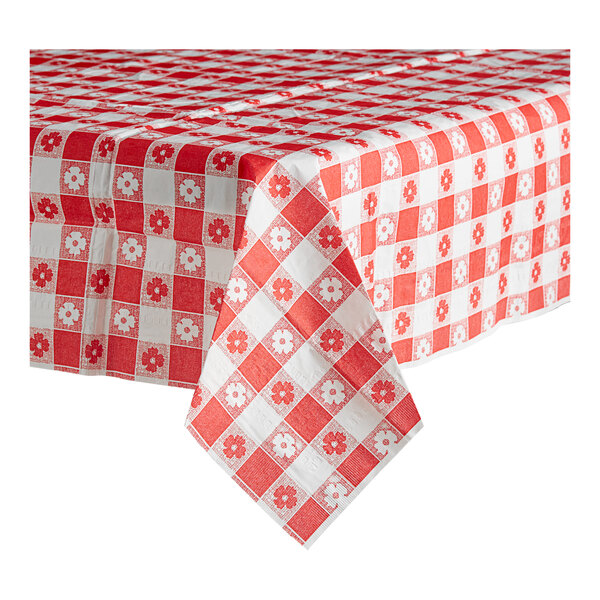 A red and white checkered Table Mate table cover on a table.