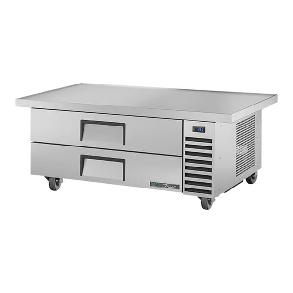 A True stainless steel chef base with two drawers.