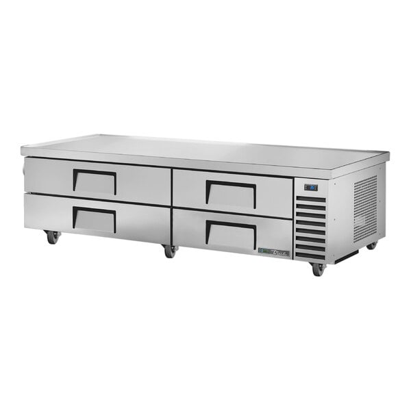A True stainless steel refrigerated chef base with four drawers.
