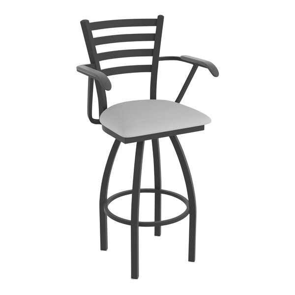 A black Holland Bar Stool Jackie Ladderback swivel bar stool with a gray vinyl seat.