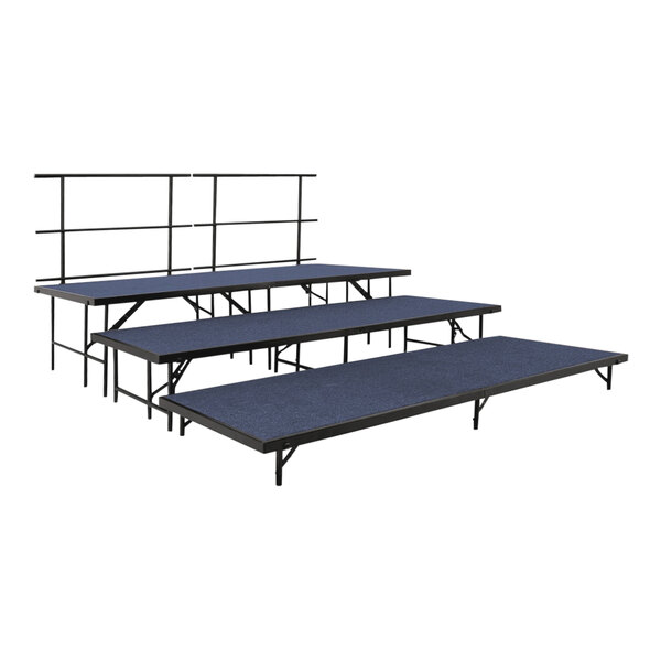 A set of National Public Seating 3-level stage risers with blue carpet seating.