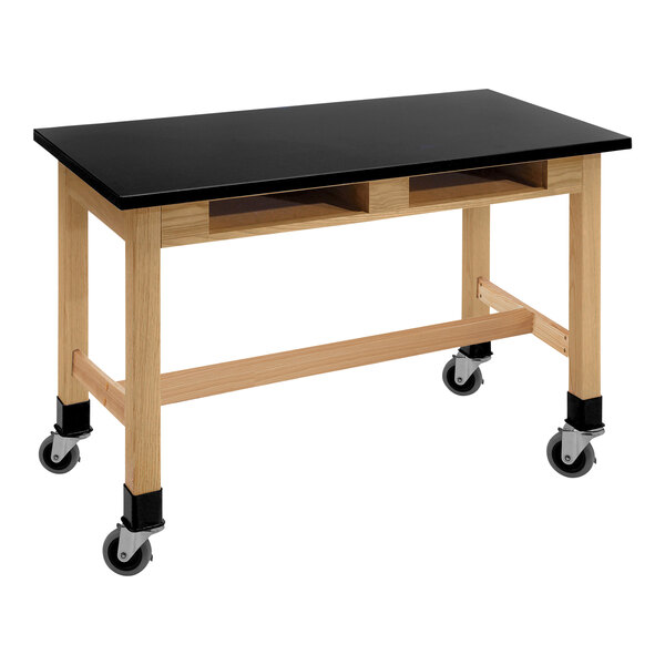 A black National Public Seating wood science lab table with casters.
