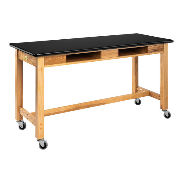 A black National Public Seating wood science lab table with casters.