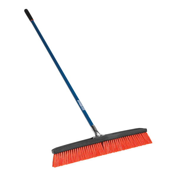 A Seymour 24" rough surface push broom with a long orange fiberglass handle.