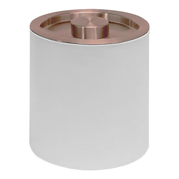 A white Room360 ice bucket with a copper lid.