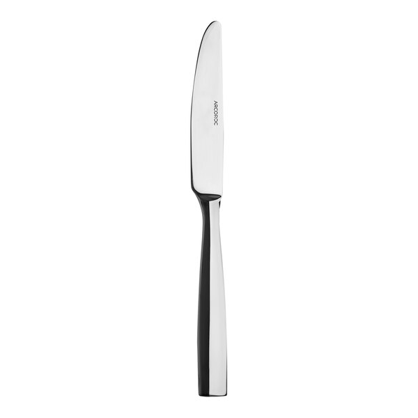 An Arcoroc stainless steel knife with a black handle.