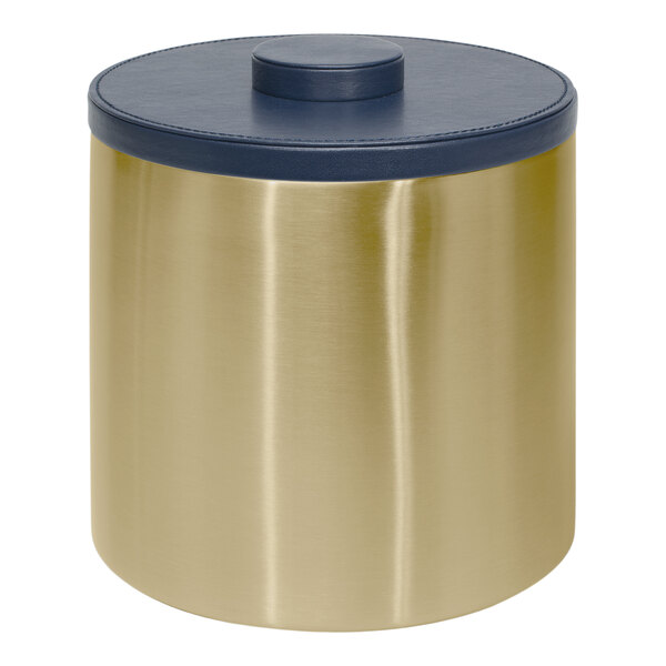 A round gold metal ice bucket with a navy blue lid.