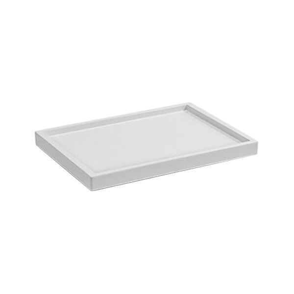 A white rectangular Room360 amenity tray.