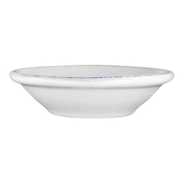 A white porcelain fruit bowl with a blue rim.
