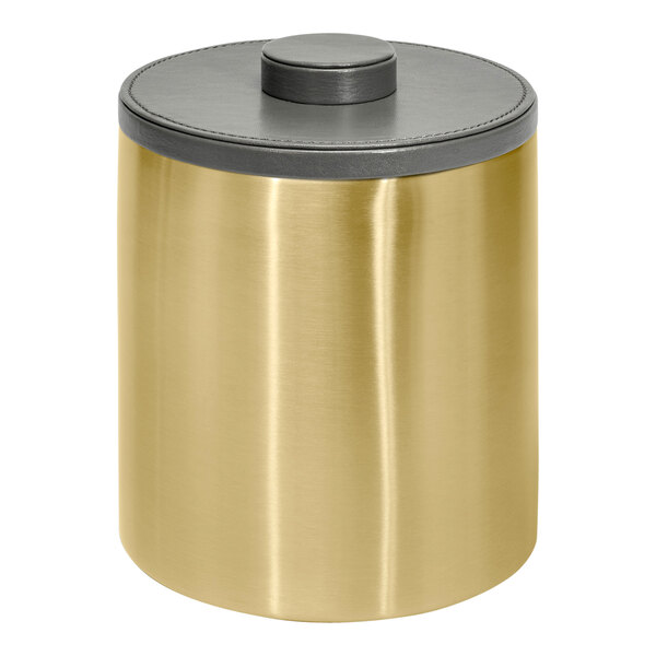 A gold container with a black lid by Room360 London.