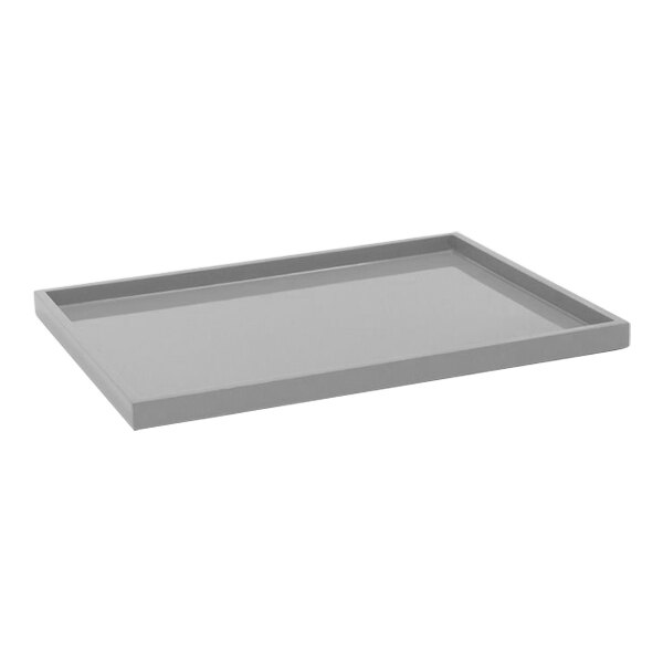 A grey rectangular Room360 New York stone resin tray.