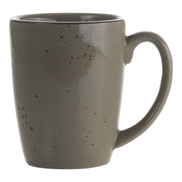 An International Tableware green smoke stoneware mug with a handle and speckled spots.
