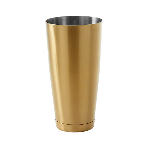 An American Metalcraft gold and silver weighted cocktail shaker.