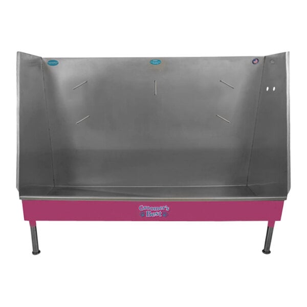 A metal walk-in bathing tub with a pink bottom and right drain.