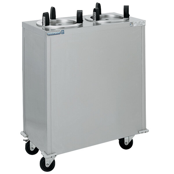 A stainless steel Delfield mobile enclosed heated dish dispenser with two silver containers on wheels.