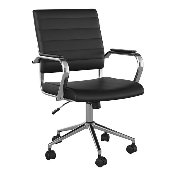 A Martha Stewart black faux leather swivel office chair with chrome wheels.