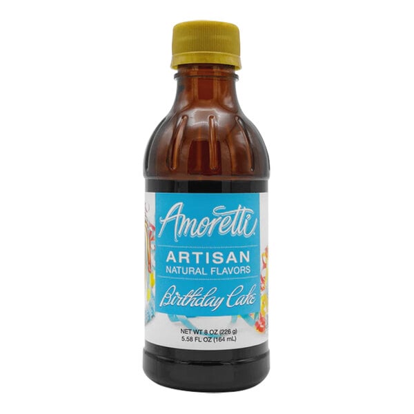A bottle of Amoretti Birthday Cake Artisan Natural Flavor Paste with a yellow cap and label.