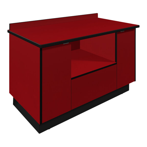 A red and black Plymold Hollyberry laminate single microwave cabinet on a counter.
