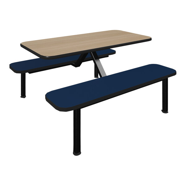 A Plymold beige table top with blue bench seats on a table with black bases.