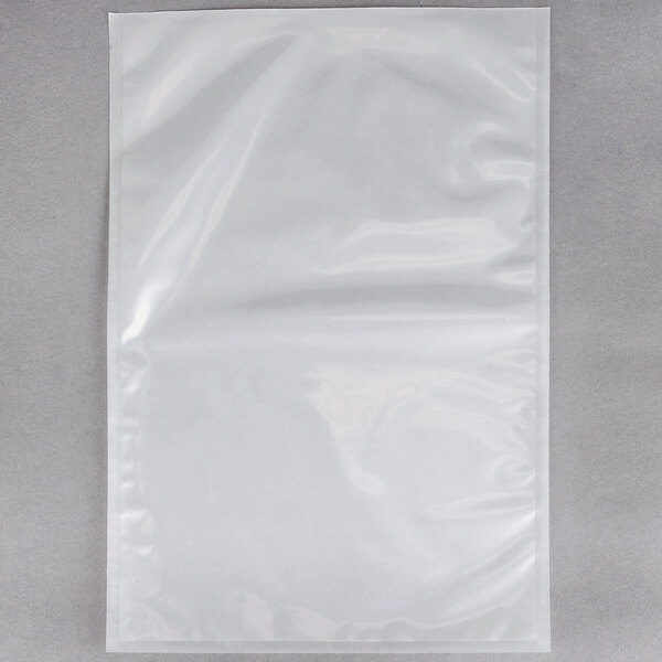 A package of ARY VacMaster chamber vacuum packaging bags on a gray surface.
