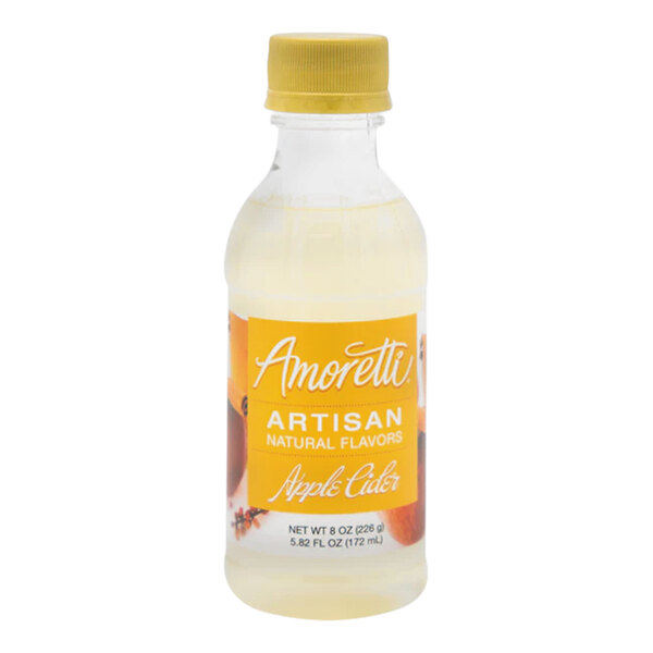 A yellow and white label on a bottle of Amoretti Apple Cider Artisan Natural Flavor Paste.