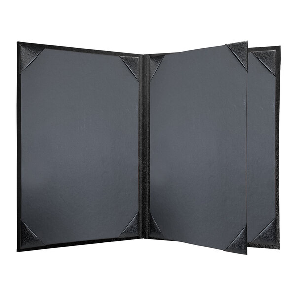 A black Oakmont menu cover with album style corners on a grey surface.