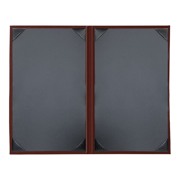 Two oak menu covers with black album style corners containing white pages.
