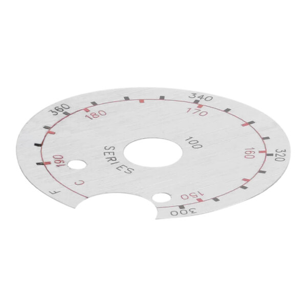 A white circular metal dial with red and black lines and numbers on it.