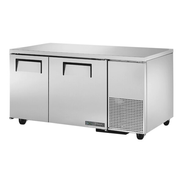 A stainless steel True undercounter refrigerator with two doors.