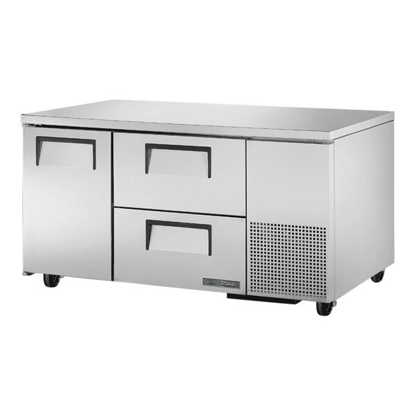 A stainless steel True undercounter refrigerator with drawers.