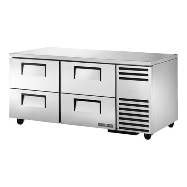 A large stainless steel True undercounter refrigerator with four drawers.