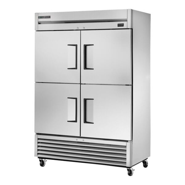 A silver True T-49-4-HC reach-in refrigerator with black handles.