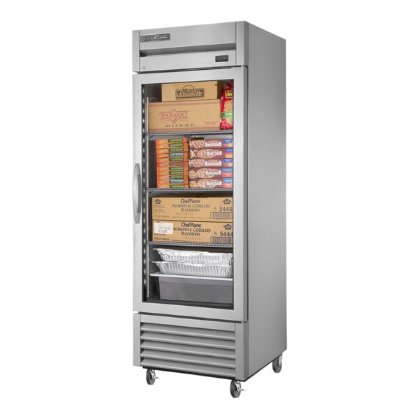 A True T-23FG-HC~FGD01 reach-in freezer with glass doors full of food.