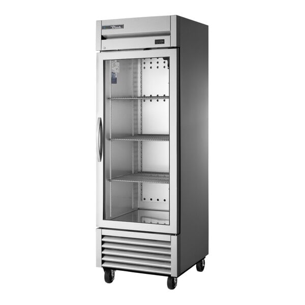 A True commercial combination refrigerator/freezer with glass doors.