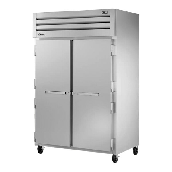 A True Spec Series white reach-in refrigerator with two solid doors.