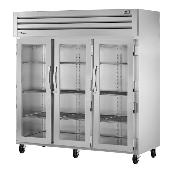 A True Spec Series reach-in refrigerator with glass doors.