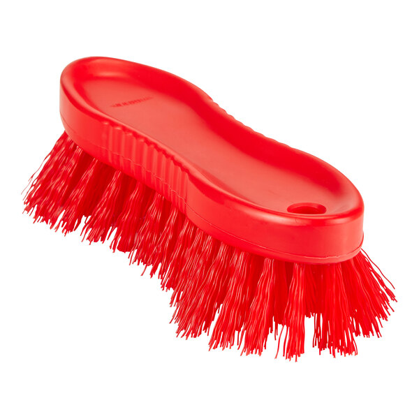A red Remco scrubbing brush with long bristles.
