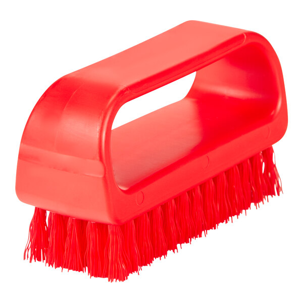 A close-up of a Remco red nail brush with a handle.
