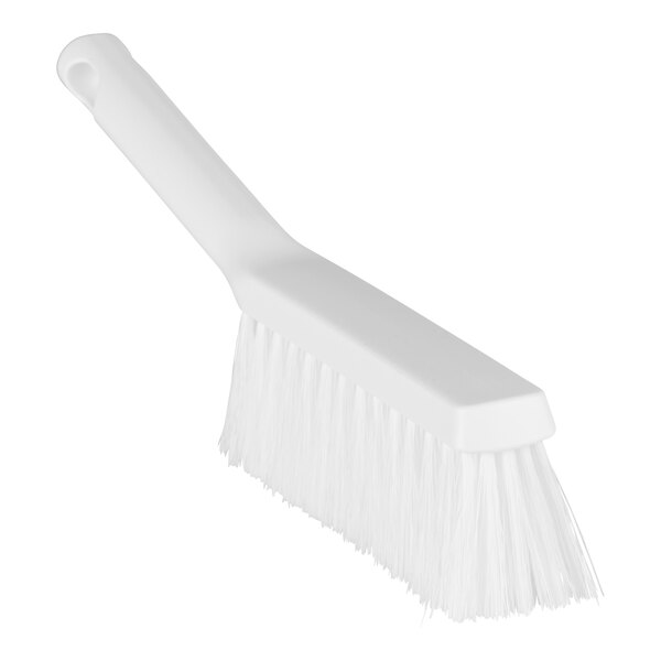 A close-up of a Remco white bench brush with medium bristles.