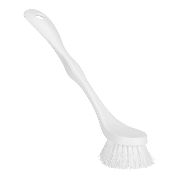 A close up of a Remco white dish brush with a handle.